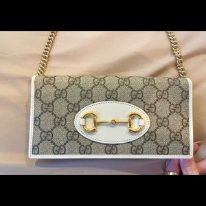 Brand new condition stunning GUCCI Horsebit 1955 wallet with chain.